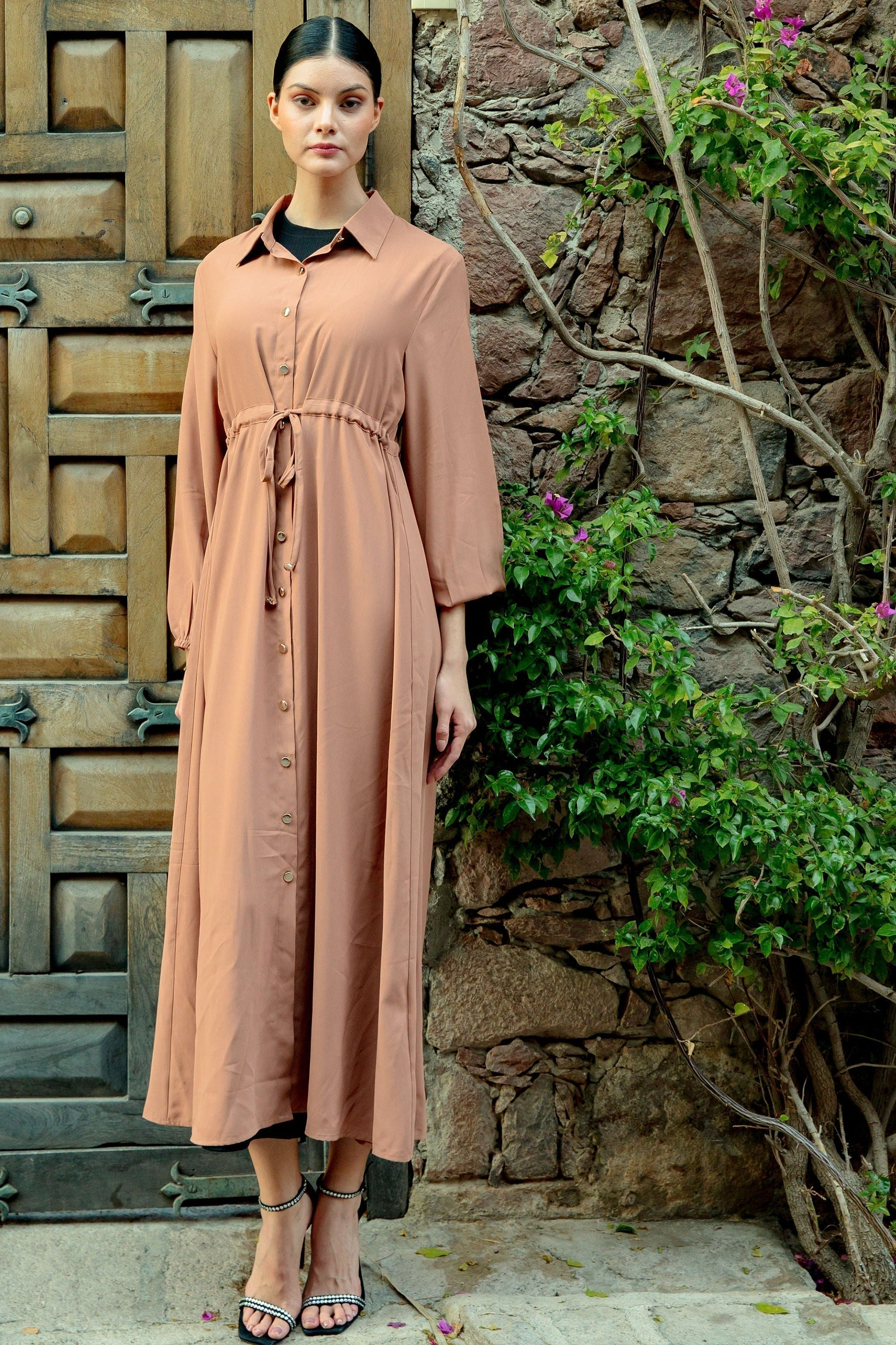 Beige button-down drawstring maxi dress with long sleeves and tie waist