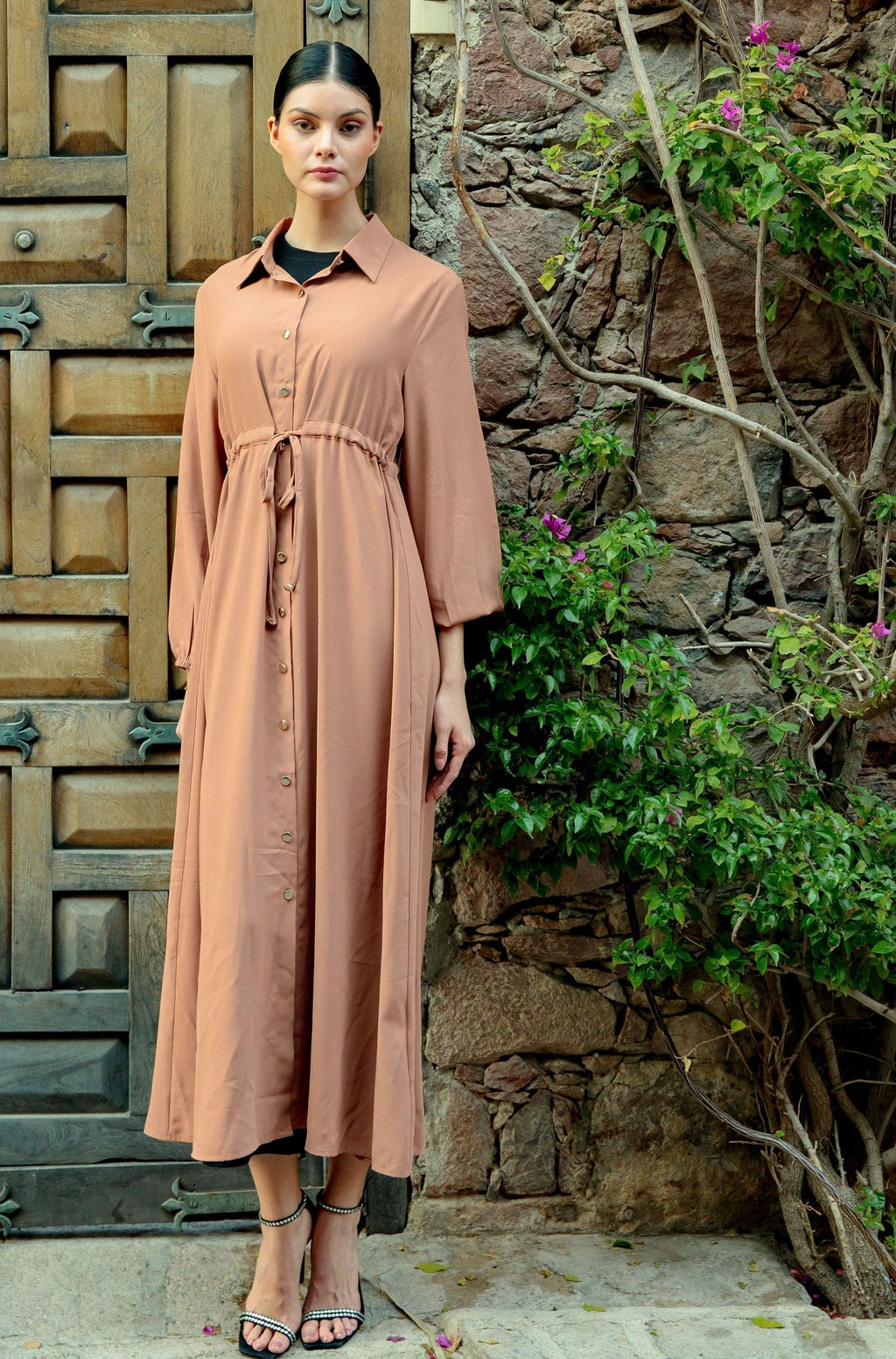 Beige button-down drawstring maxi dress on woman