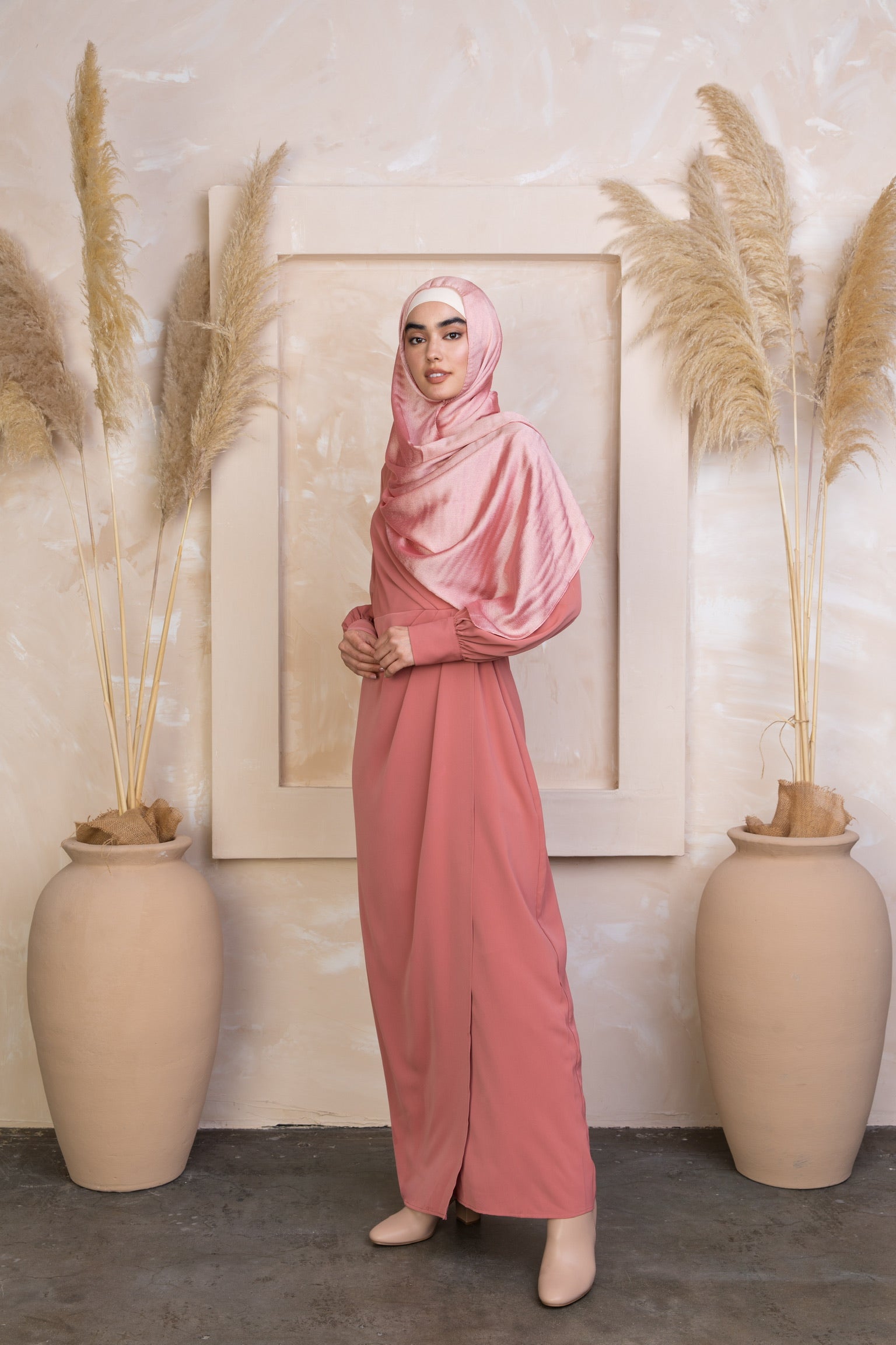 Woman in pink Coral Wrap Maxi Dress and hijab